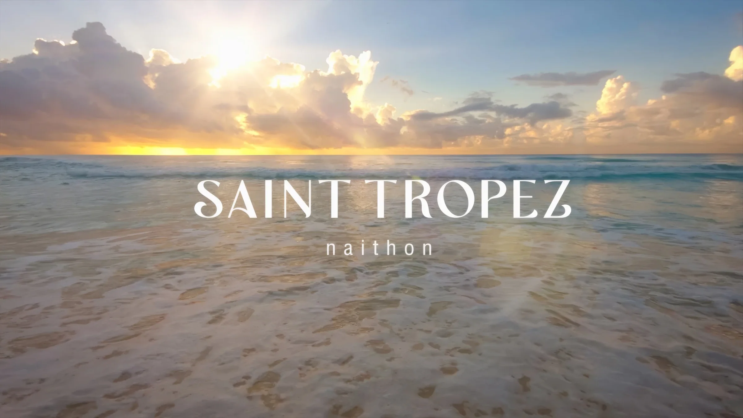 Saint Tropez Naithon — brand frame over the sea